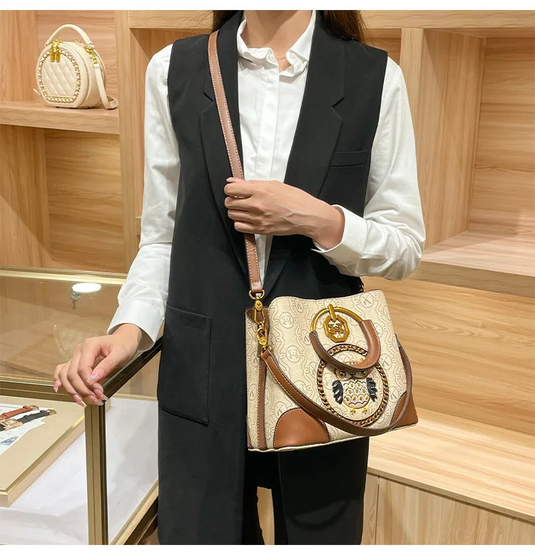Women's handbag, genuine leather carrying bucket bag, new 2025 high-end design, fashionable single shoulder crossbody bag