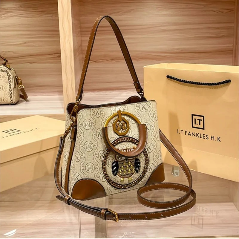 Women's handbag, genuine leather carrying bucket bag, new 2025 high-end design, fashionable single shoulder crossbody bag