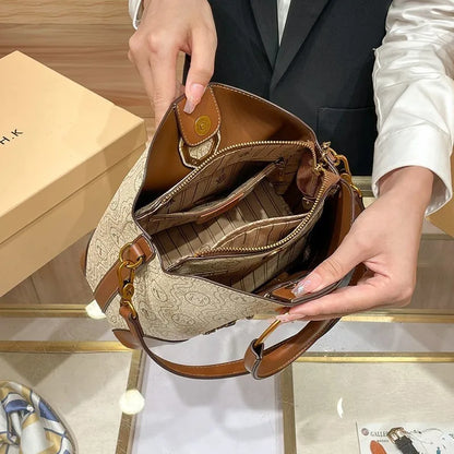 Women's handbag, genuine leather carrying bucket bag, new 2025 high-end design, fashionable single shoulder crossbody bag