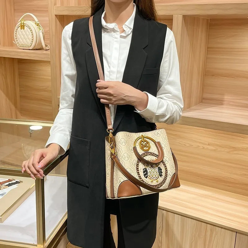 Women's handbag, genuine leather carrying bucket bag, new 2025 high-end design, fashionable single shoulder crossbody bag