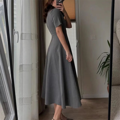 2025 new women's clothing European and American style fashionable design sense two-color wave wide swing round neck dress