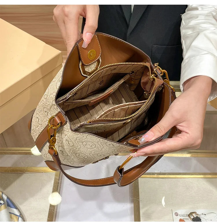 Women's handbag, genuine leather carrying bucket bag, new 2025 high-end design, fashionable single shoulder crossbody bag