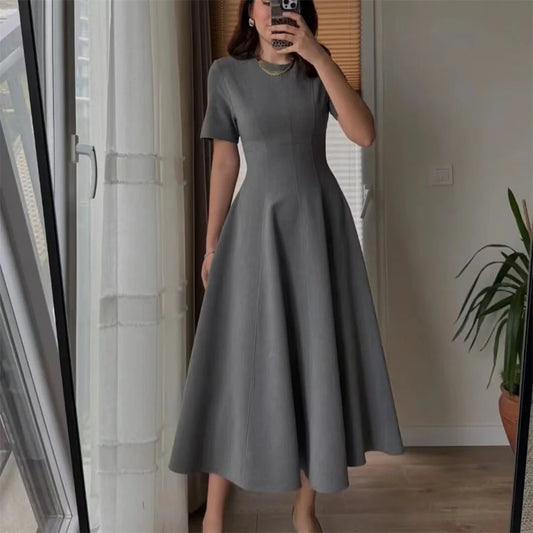 2025 new women's clothing European and American style fashionable design sense two-color wave wide swing round neck dress