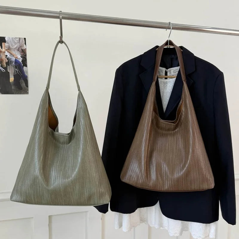 Stylish Ladies Hand Bag Boasting Trendy Design And Fine Craftsmanship Made Of Premium Anti-Scratch Leather