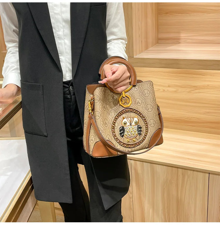 Women's handbag, genuine leather carrying bucket bag, new 2025 high-end design, fashionable single shoulder crossbody bag