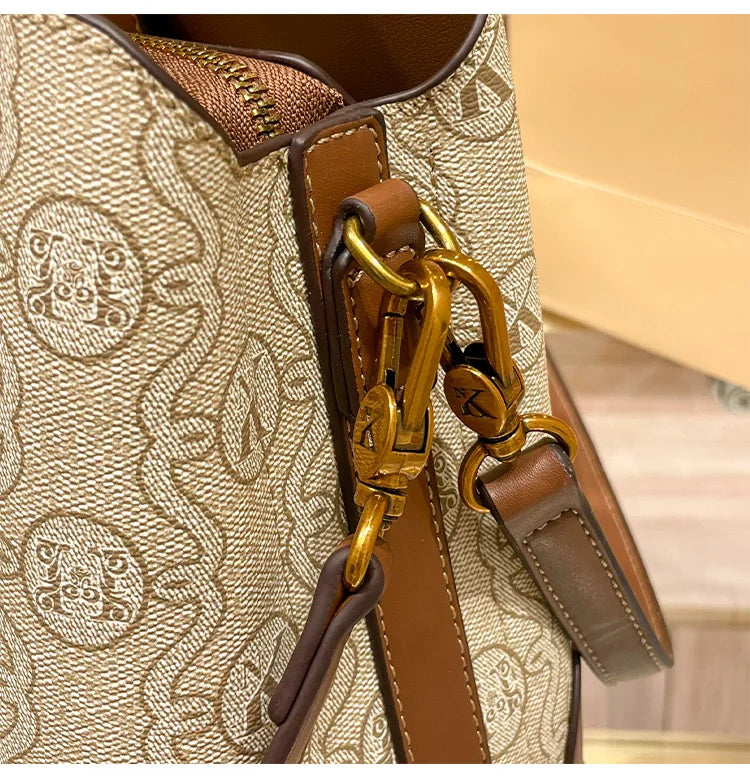 Women's handbag, genuine leather carrying bucket bag, new 2025 high-end design, fashionable single shoulder crossbody bag