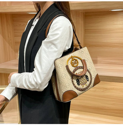 Women's handbag, genuine leather carrying bucket bag, new 2025 high-end design, fashionable single shoulder crossbody bag